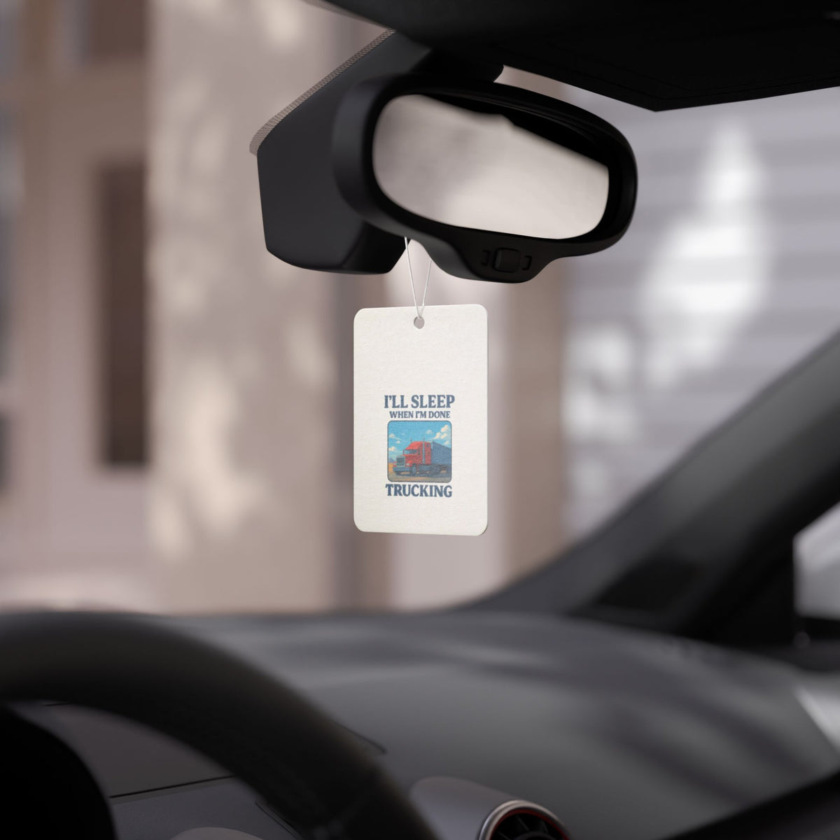 Black truck driver car air freshener with "I'll Sleep When I'm Done" text, accessory by Printify for vehicle interior.