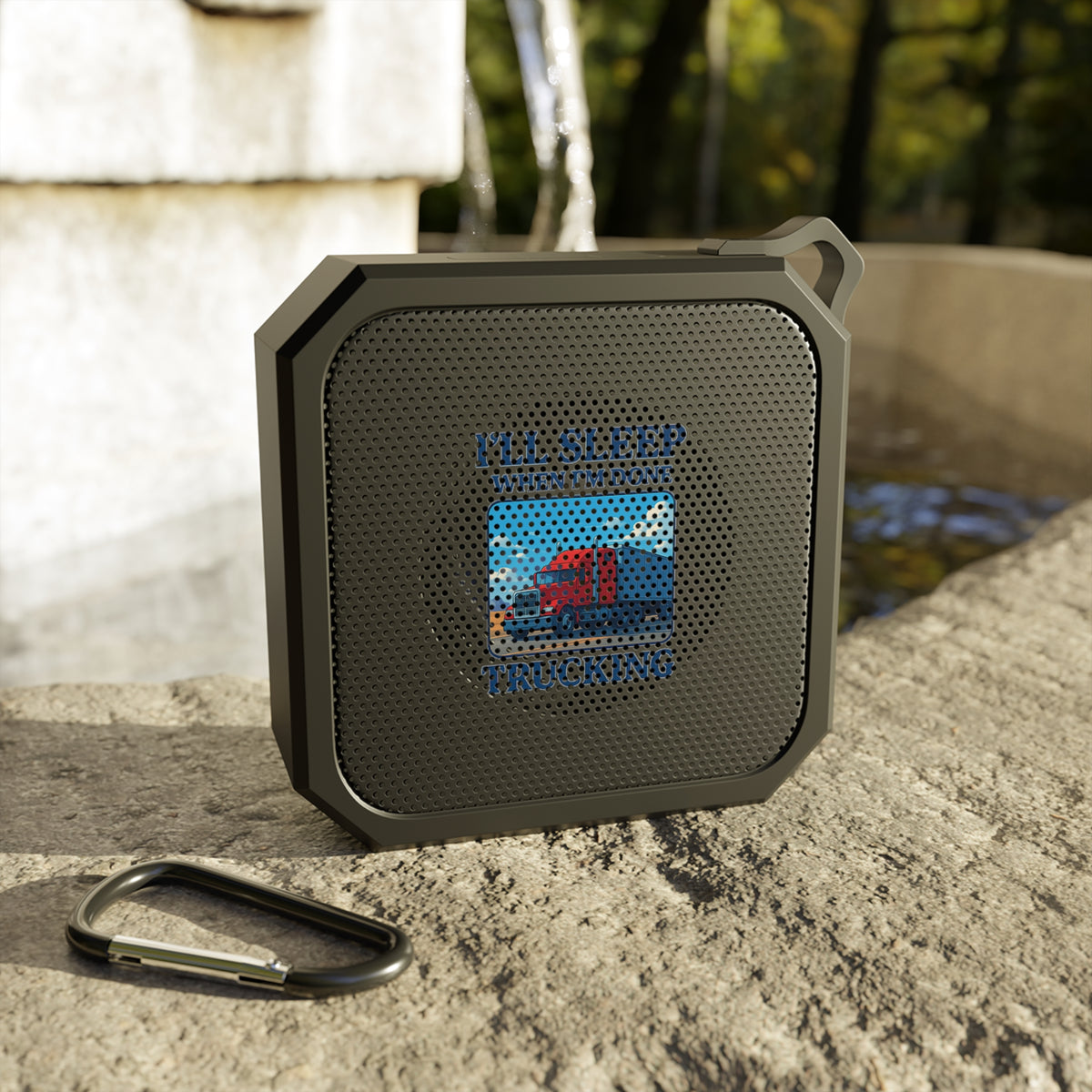 Black Outdoor Bluetooth Speaker from Trucking Life Edition, versatile accessory with rugged design for outdoor use.