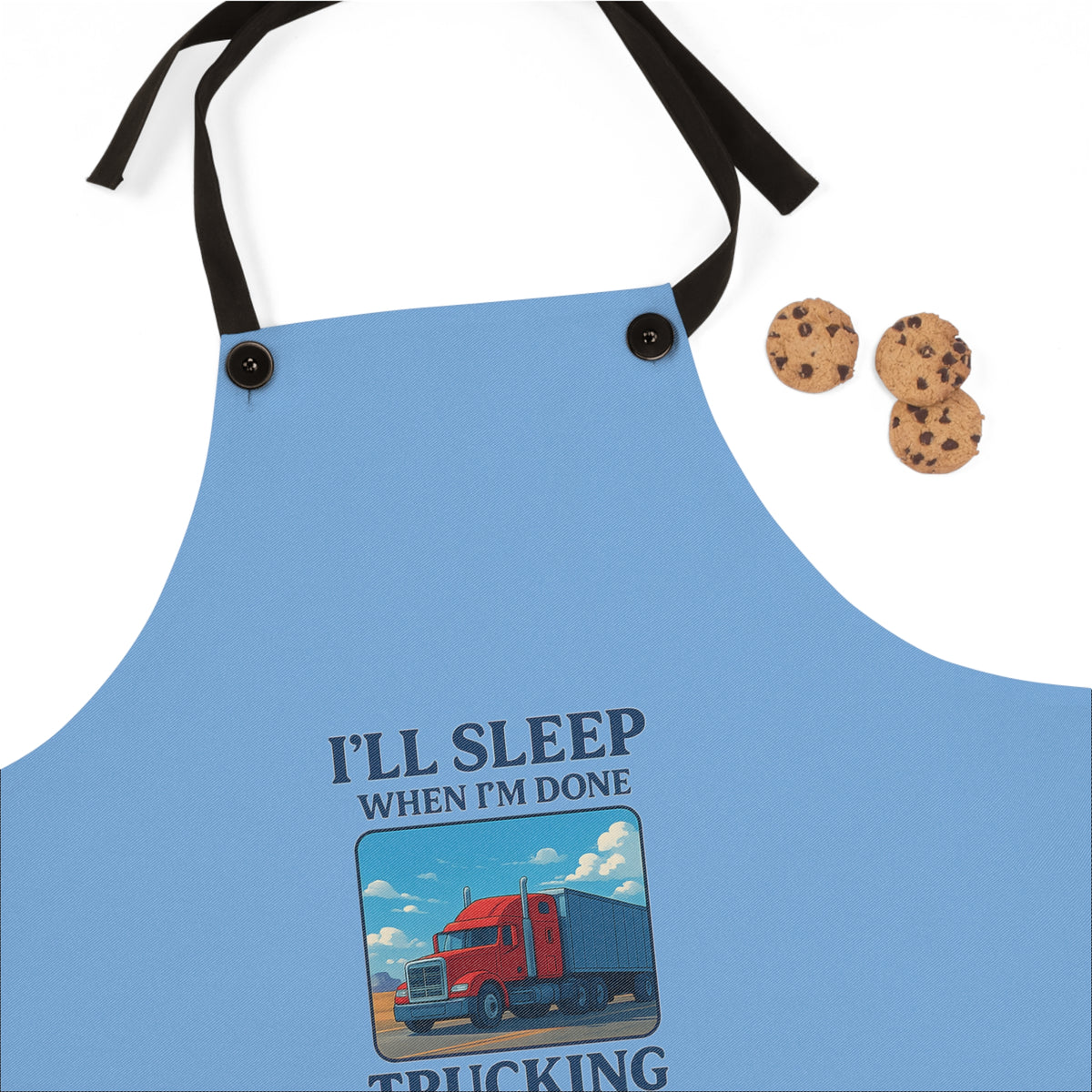 Printify truck driver humor apron with "I'll Sleep When I'm Done" slogan, lightweight kitchen accessory with adjustable straps.