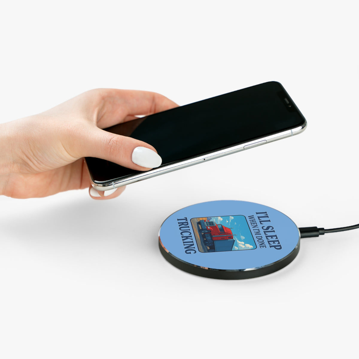 Trucking-themed wireless charger by Printify featuring "I'll Sleep When I'm Done" design, round shape, accessory for charging devices.