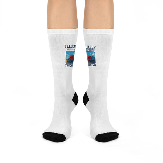 White all-over print trucking crew socks by Printify with humorous "I'll Sleep When I'm Done" design.