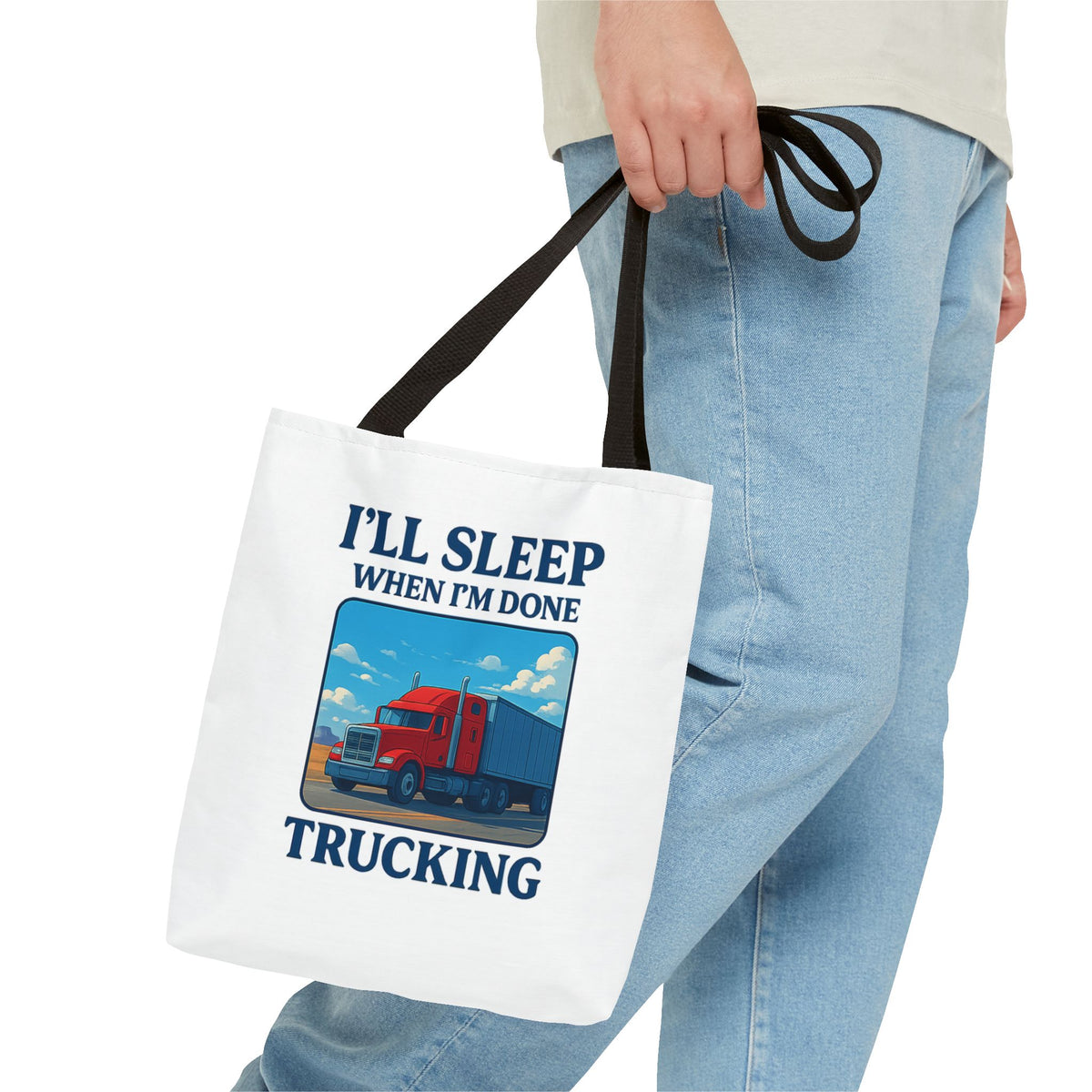 Black truck driver tote bag with "I'll Sleep When I'm Done" slogan, casual bag perfect for truckers, by Printify.