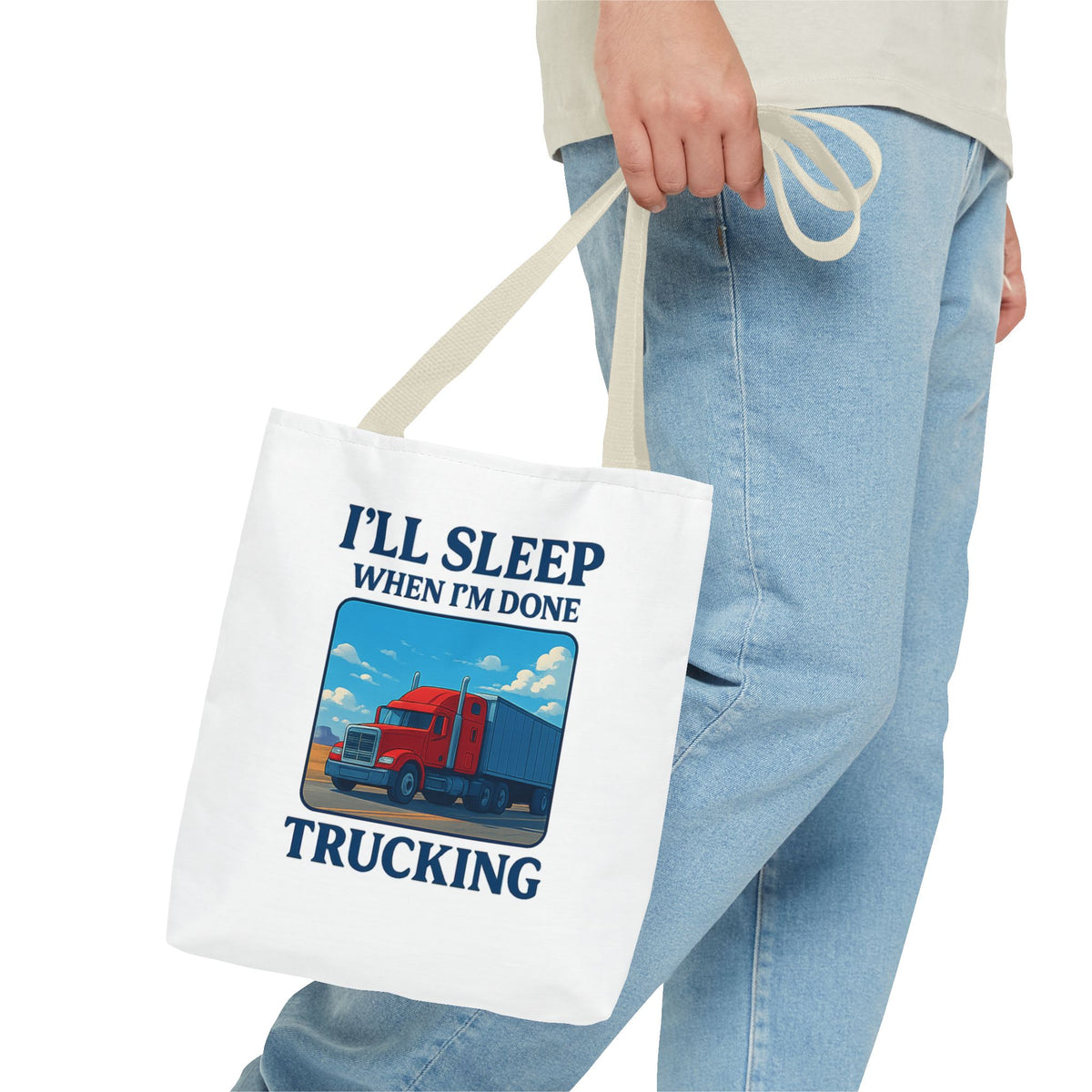 Black Printify truck driver tote bag with "I'll Sleep When I'm Done" slogan, perfect gift for truckers, 13x13 inches.