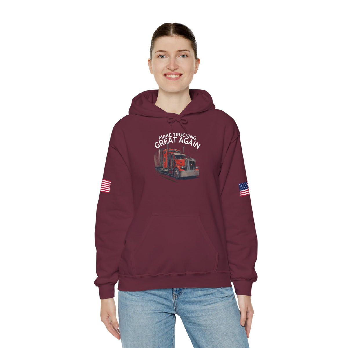 Dark heather hoodie with "Make Trucking Great Again" text, American flag sleeves, featuring a semi-truck graphic.