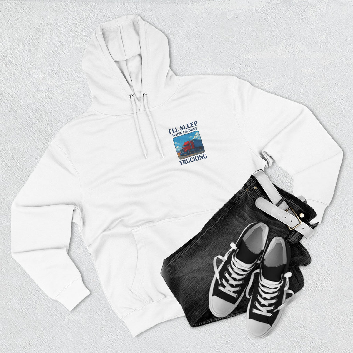 Heather grey Trucker's Fleece Hoodie by Printify featuring the phrase "I'll Sleep When I'm Done" on the front.