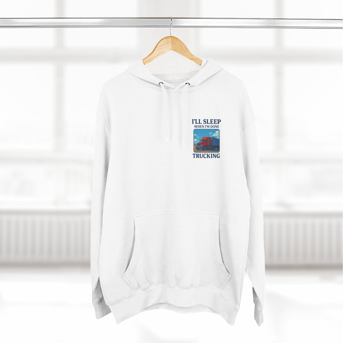 Heather grey Trucker's Fleece Hoodie by Printify featuring the phrase "I'll Sleep When I'm Done" printed on the front.
