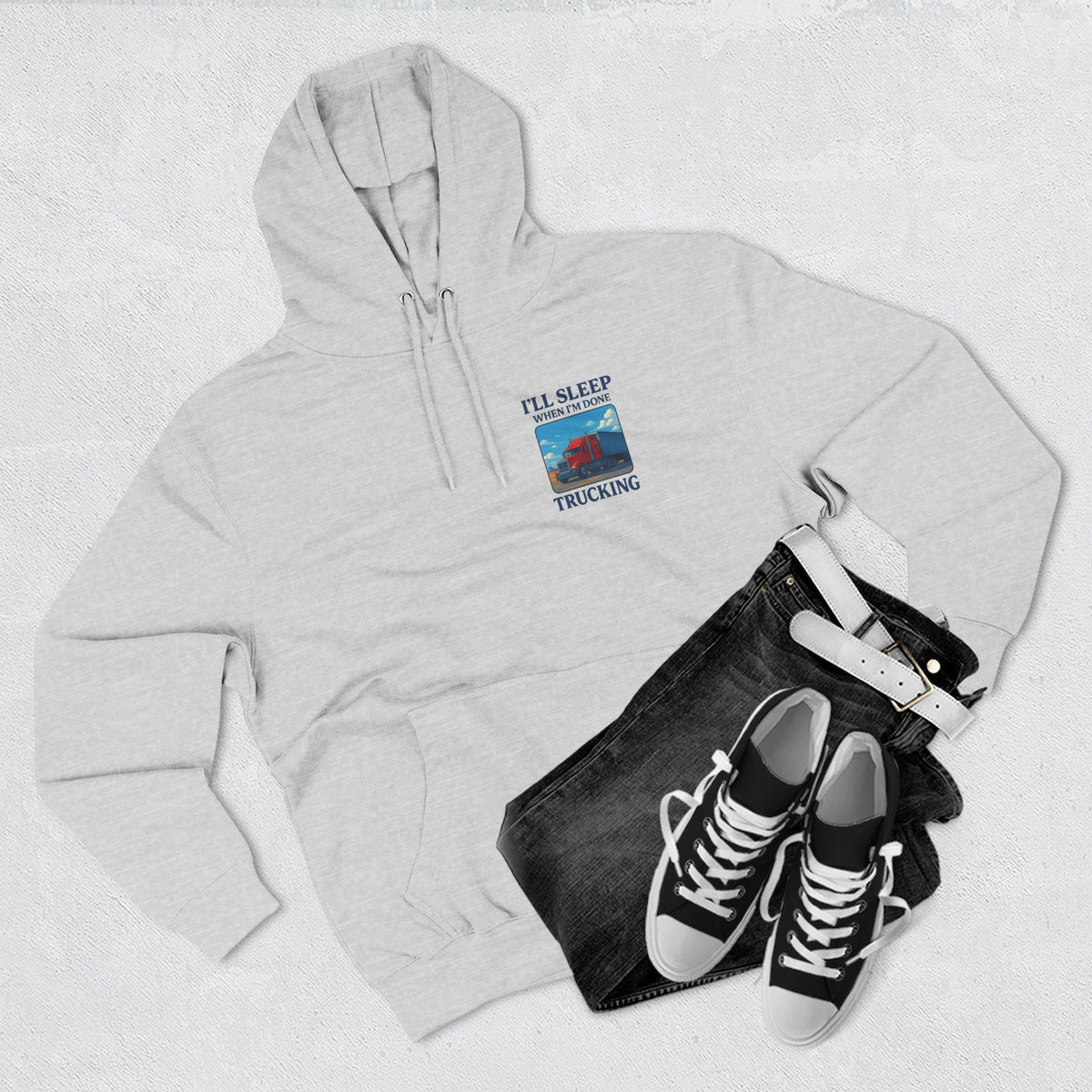 Heather grey Trucker's Fleece Hoodie by Printify with "I'll Sleep When I'm Done" print, soft fabric, casual fit, front view