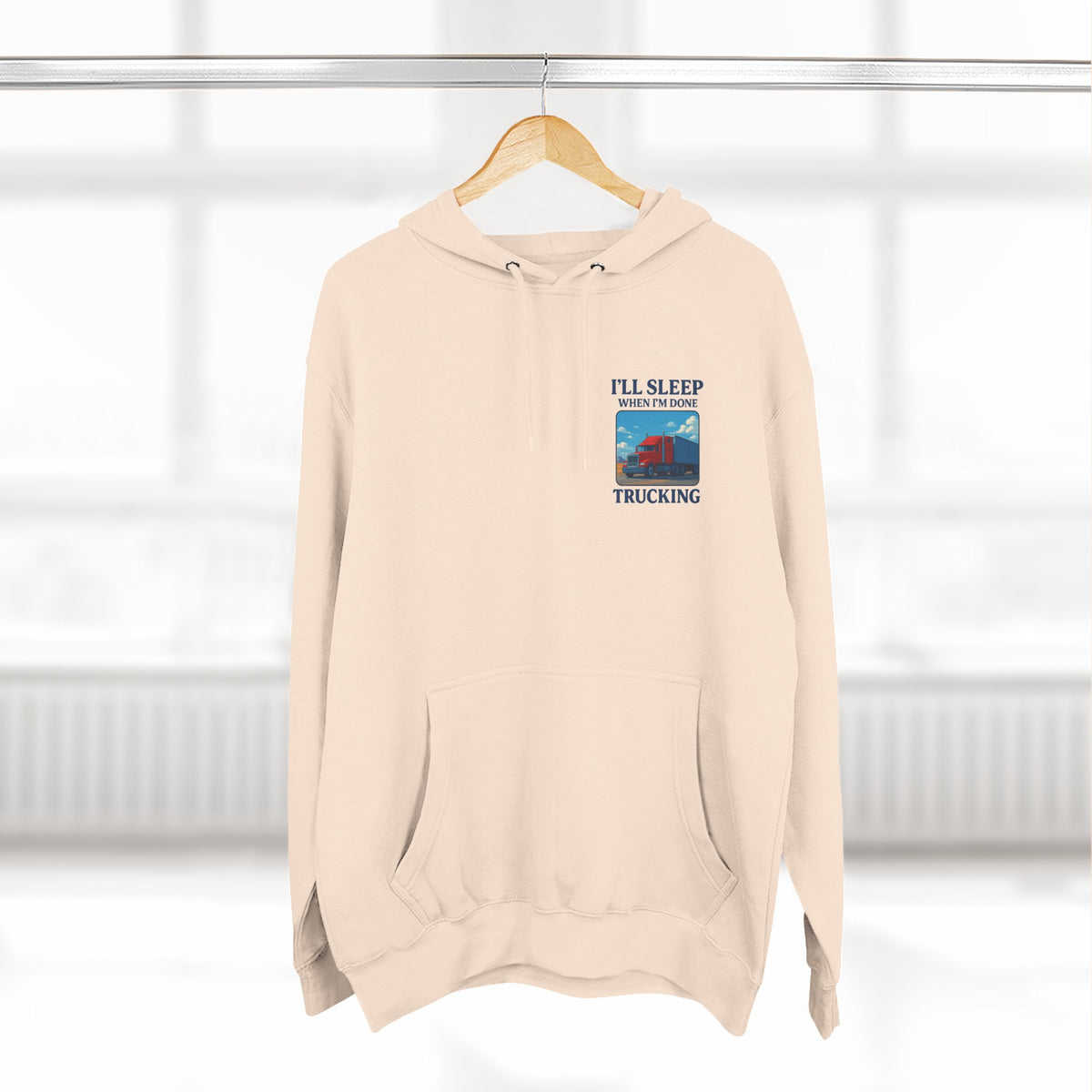Heather grey Trucker's Fleece Hoodie by Printify featuring the phrase "I'll Sleep When I'm Done" on the front.