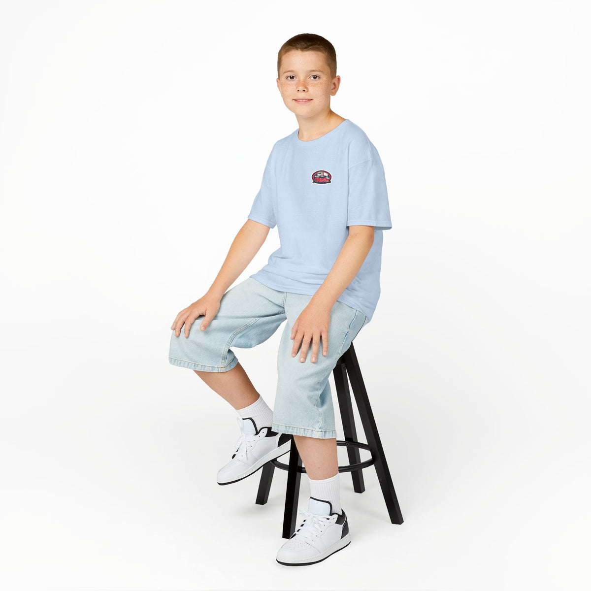 Red kids' heavy cotton tee featuring a humorous truck parking design, perfect for young adventurers, by Printify.