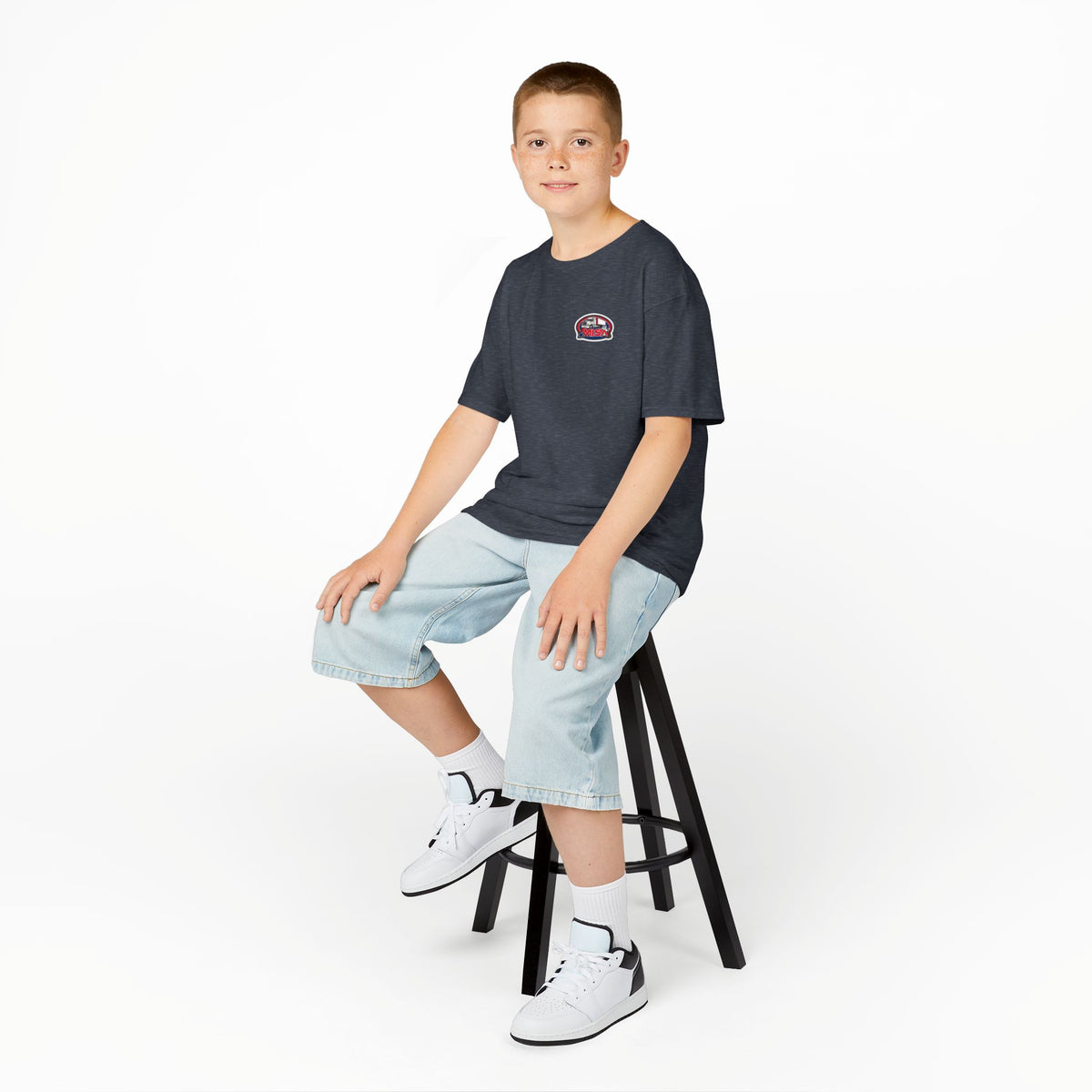 Kids heavy cotton T-shirt featuring a humorous truck parking design, perfect for young adventurers, by Printify.