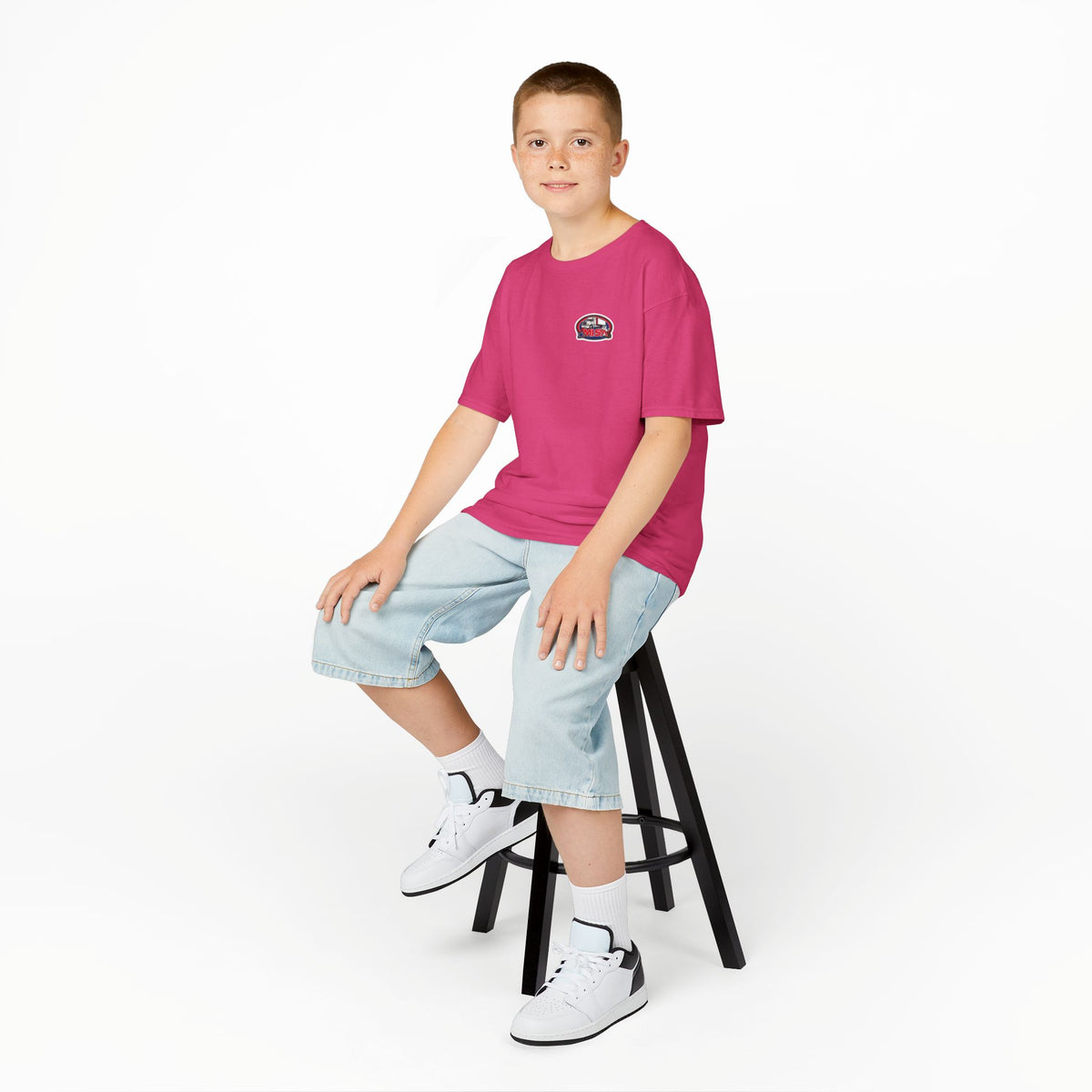 Red Kids Heavy Cotton Tee featuring humorous truck parking design, perfect for young adventurers, by Printify.