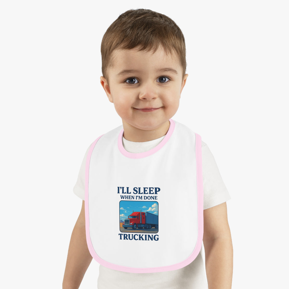 Funny trucking baby bib from Printify featuring "I'll Sleep When I'm Done" phrase, made for kids, in black and white.