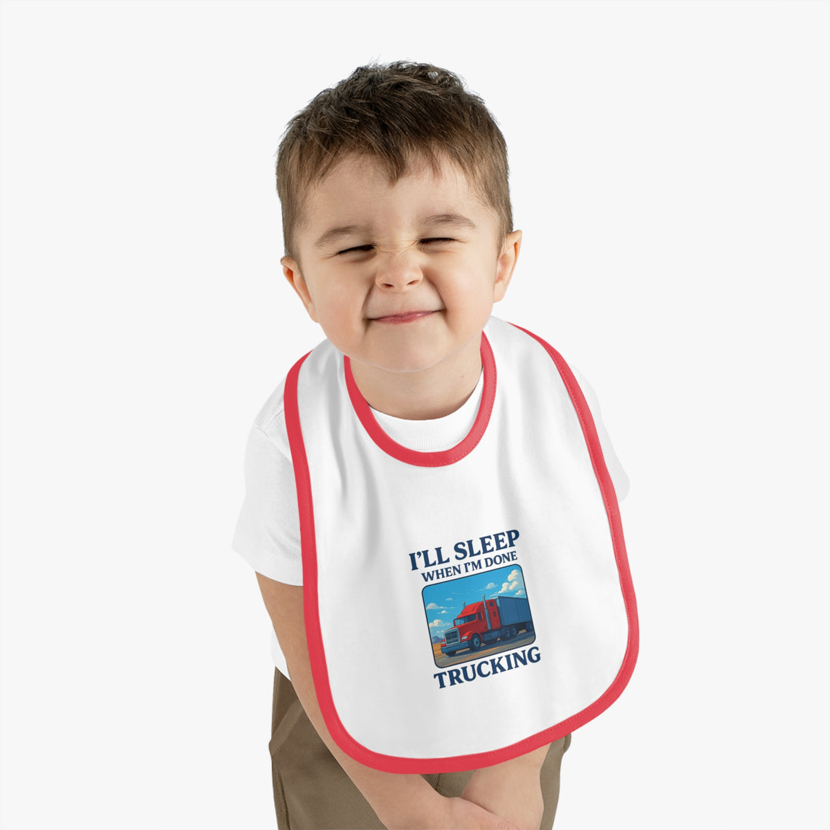 Funny trucking baby bib by Printify featuring the phrase "I'll Sleep When I'm Done" in black and white, suitable for kids.