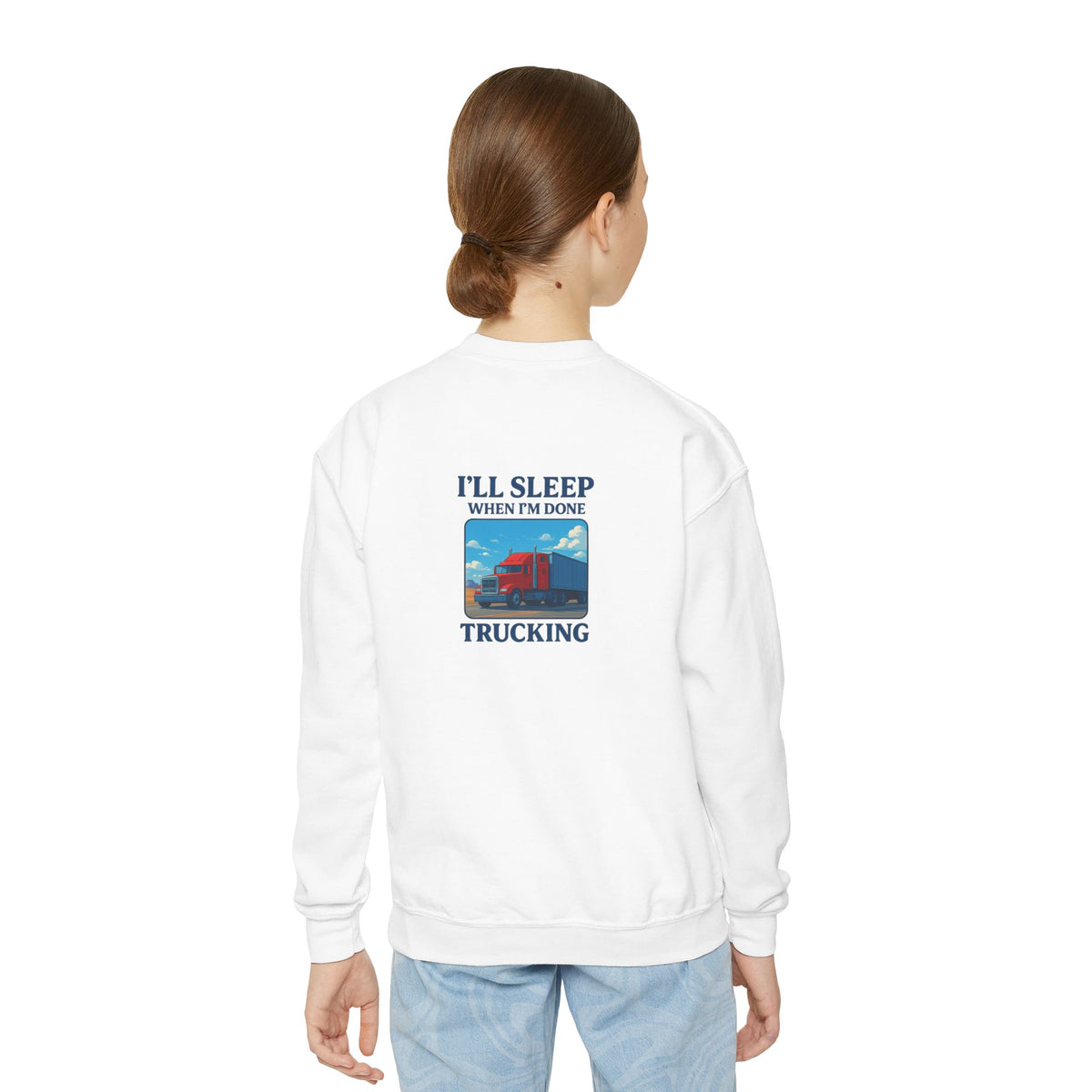 White youth crewneck sweatshirt by Printify with "I'll Sleep When I'm Done Trucking" graphic, suitable for kids' casual wear.