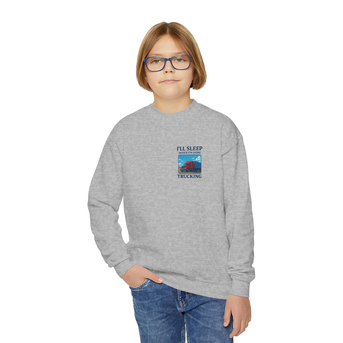 White youth crewneck sweatshirt by Printify featuring the phrase "I'll Sleep When I'm Done Trucking" for kids.