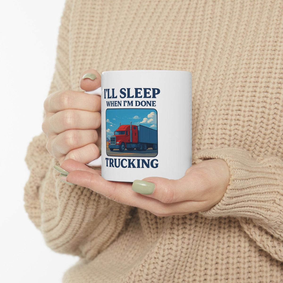 Printify ceramic mug featuring truck driver theme with bold text "I’ll Sleep When I’m Done Trucking," ideal for truckers.