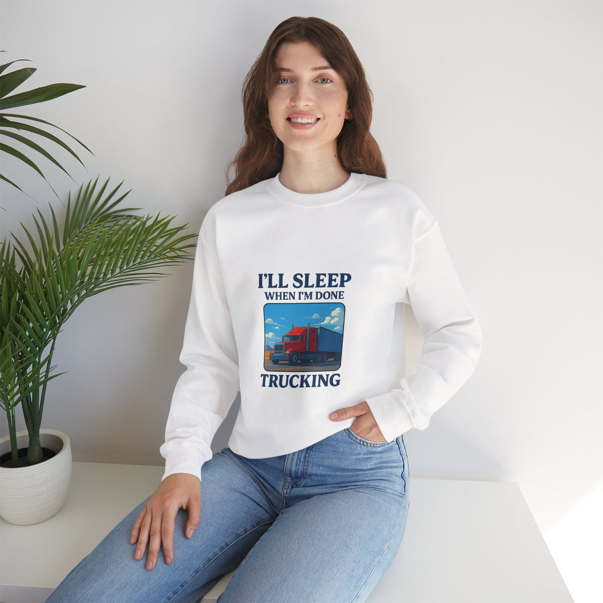 Ash-colored Printify truck driver sweatshirt with "I'll Sleep When I'm Done" print, cozy unisex crewneck for casual comfort.