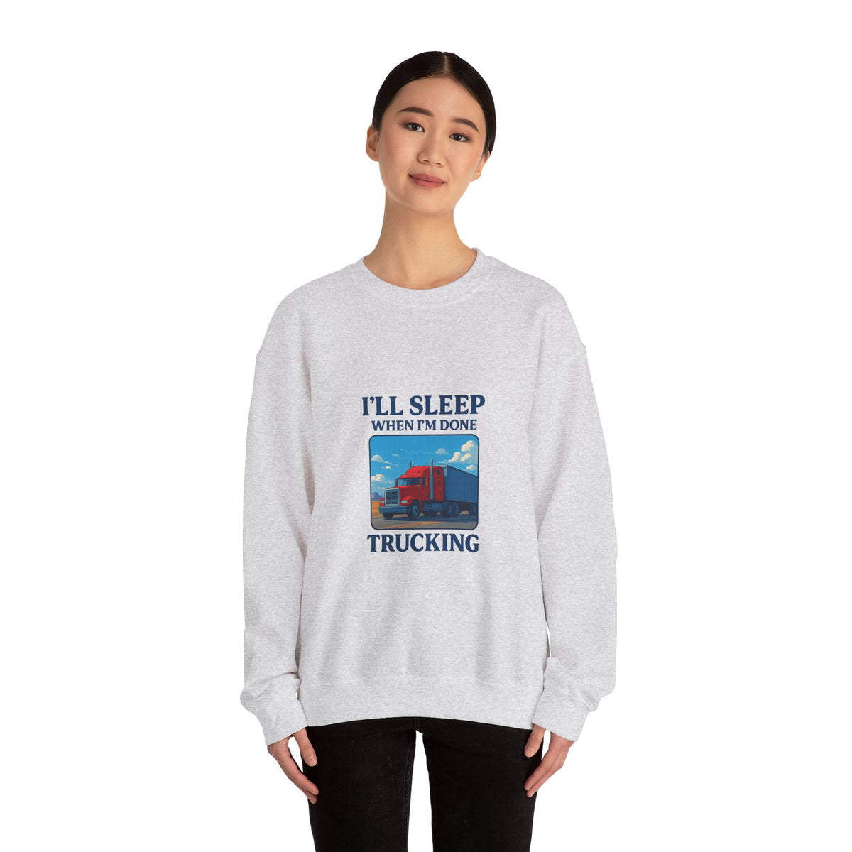Unisex ash-colored truck driver sweatshirt with "I'll Sleep When I'm Done" print, cozy crewneck design by Printify.