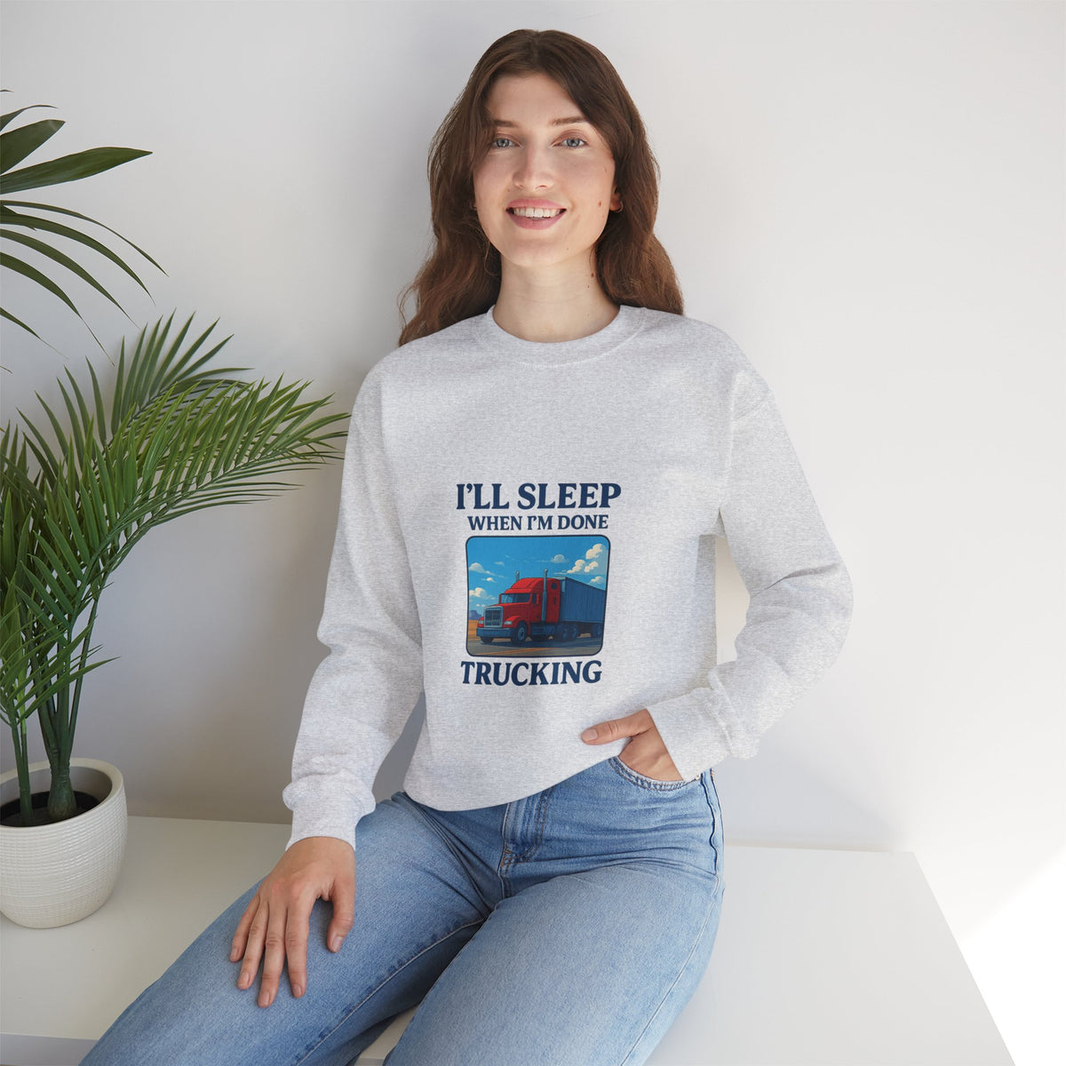 Ash-colored truck driver sweatshirt by Printify featuring the "I'll Sleep When I'm Done" slogan, cozy unisex crewneck style.