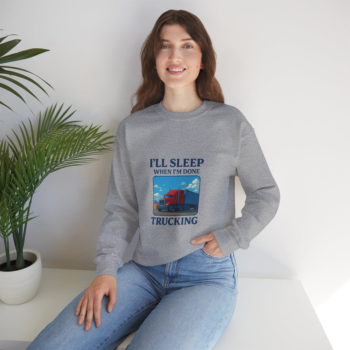 Ash-colored Printify truck driver sweatshirt with "I'll Sleep When I'm Done" slogan on cozy unisex crewneck.