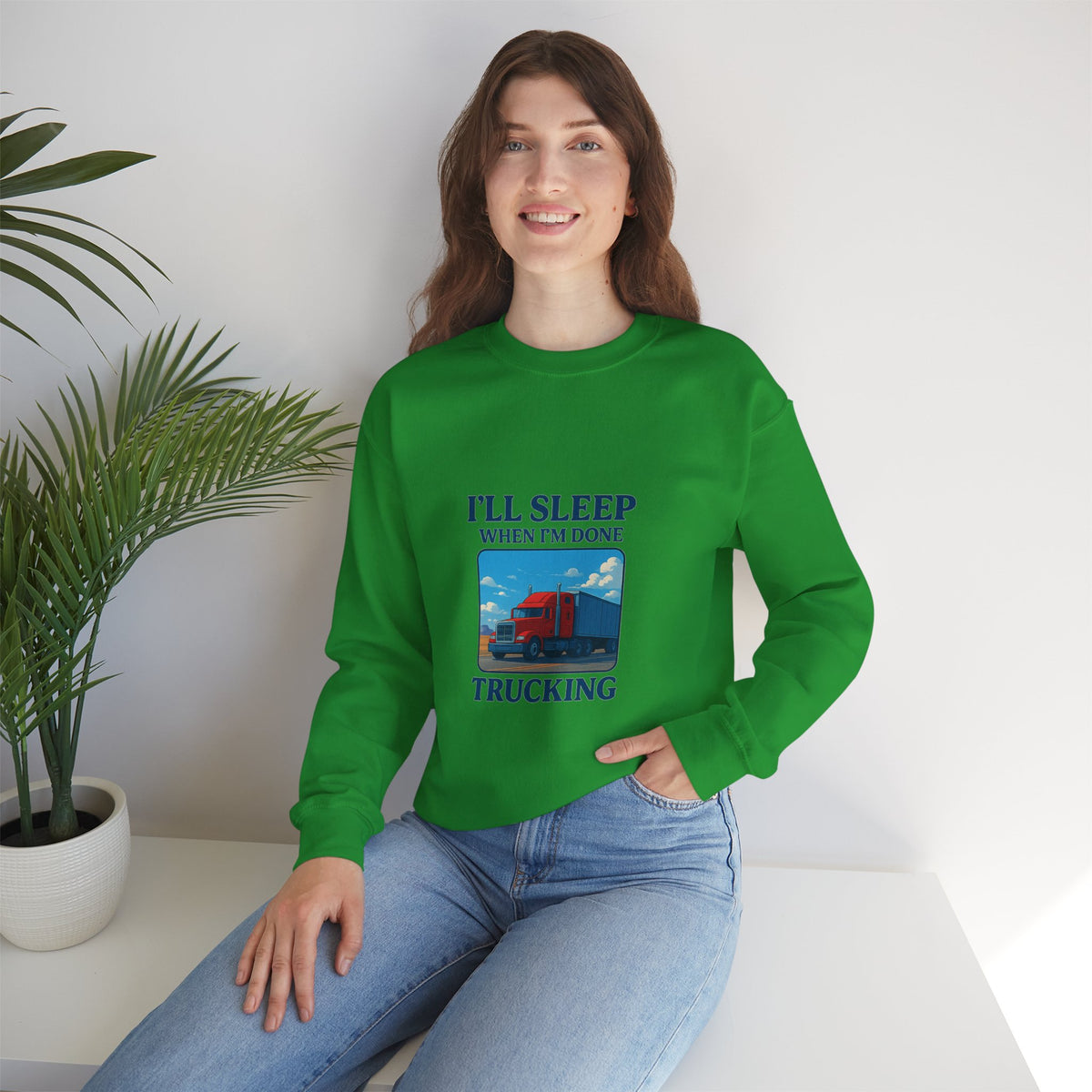 Ash-colored truck driver sweatshirt by Printify featuring "I'll Sleep When I'm Done" slogan, cozy unisex crewneck design.