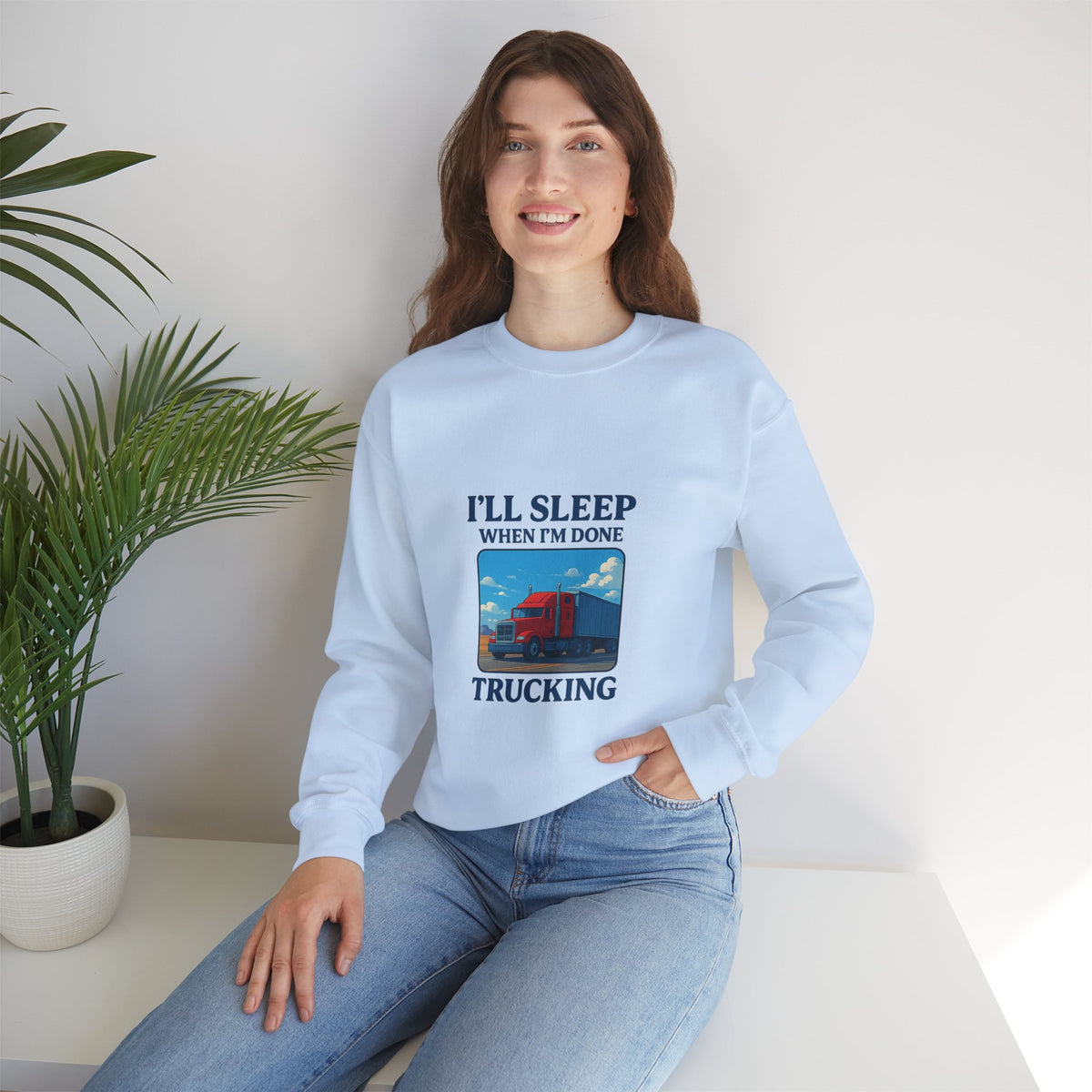 Ash-colored truck driver sweatshirt by Printify featuring "I'll Sleep When I'm Done" slogan on a cozy unisex crewneck.