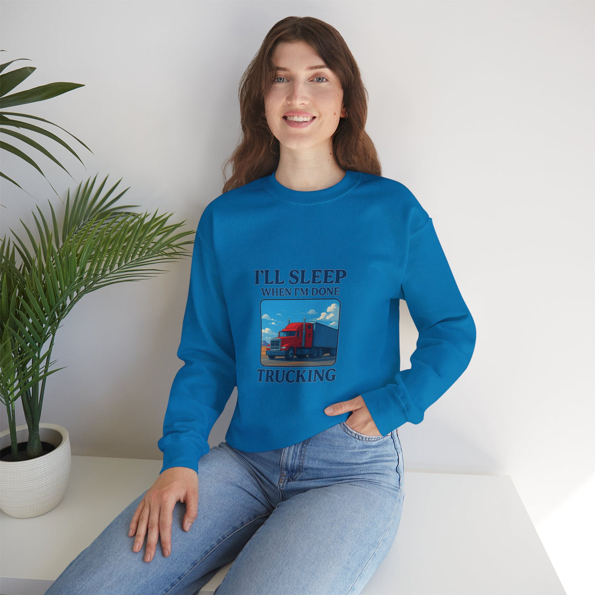 Ash-colored Printify truck driver sweatshirt with "I'll Sleep When I'm Done" slogan, cozy unisex crewneck for casual wear.