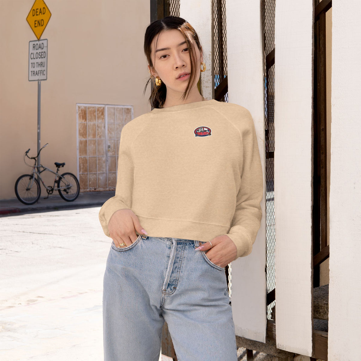 Black women's cropped fleece sweatshirt with fun graphic design, cozy fit, from Printify.