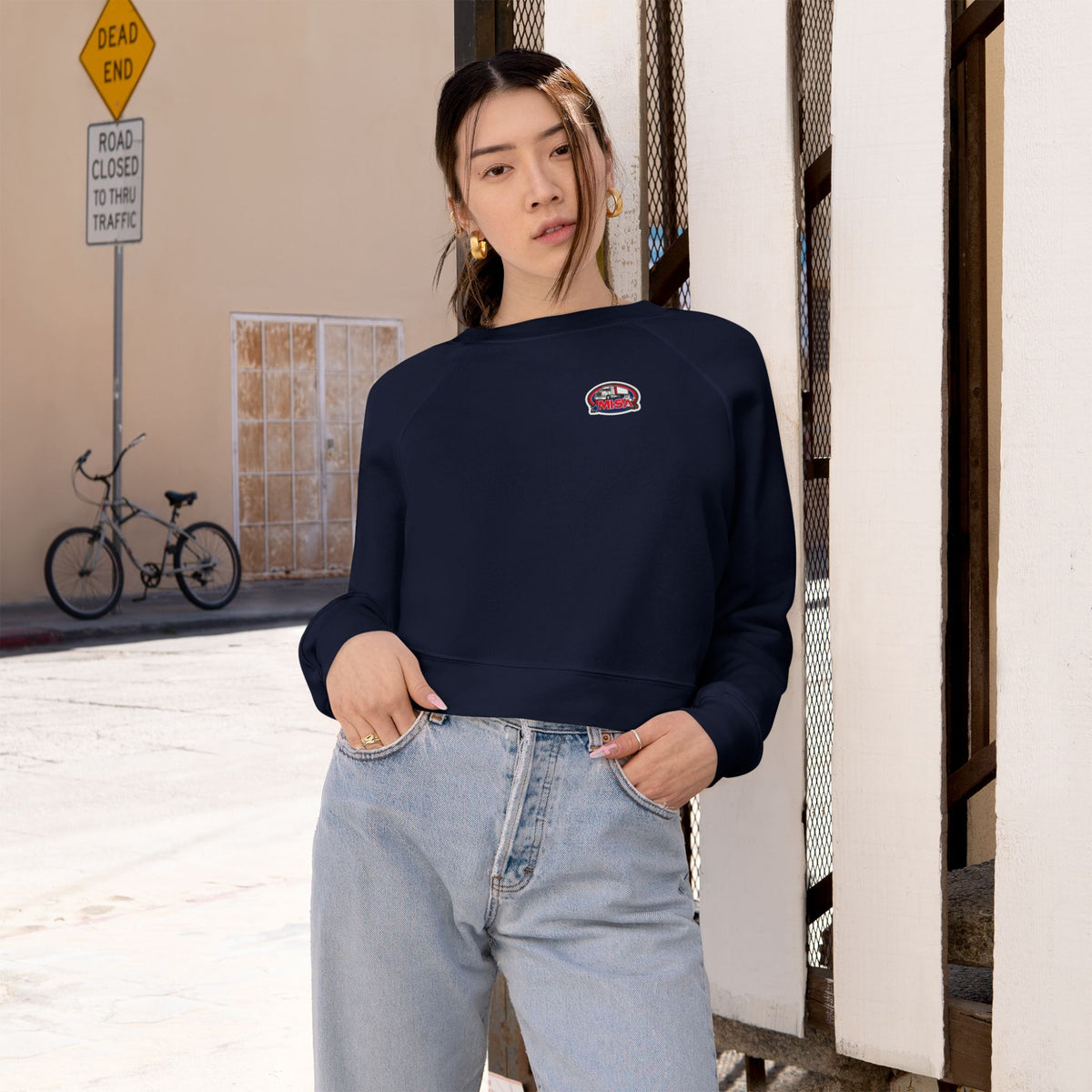 Black women's cropped fleece sweatshirt by Printify featuring a fun graphic design, cozy and stylish for casual wear.