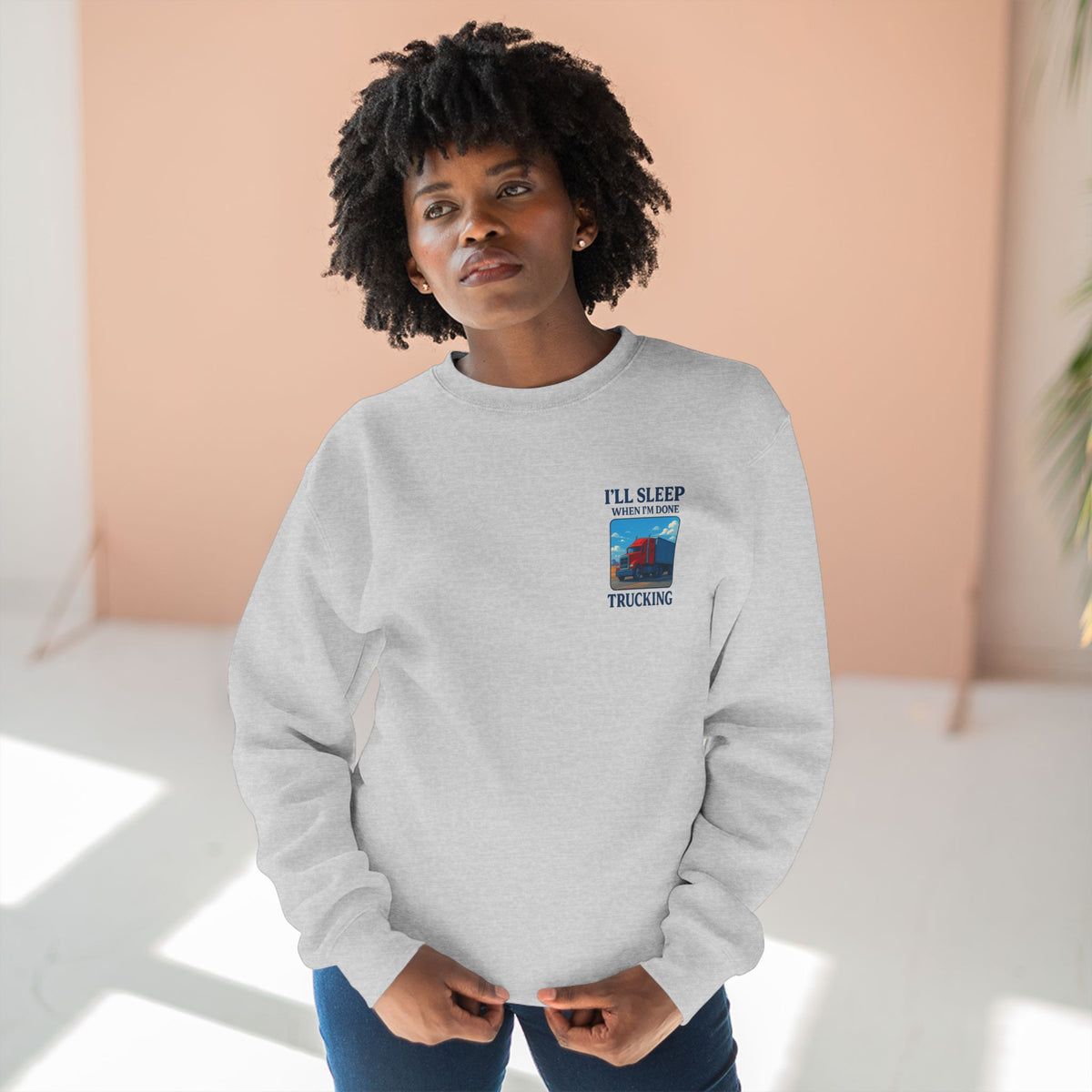 Heather grey Trucker Life unisex crewneck sweatshirt with "I'll Sleep When I'm Done" print, casual and comfortable clothing.