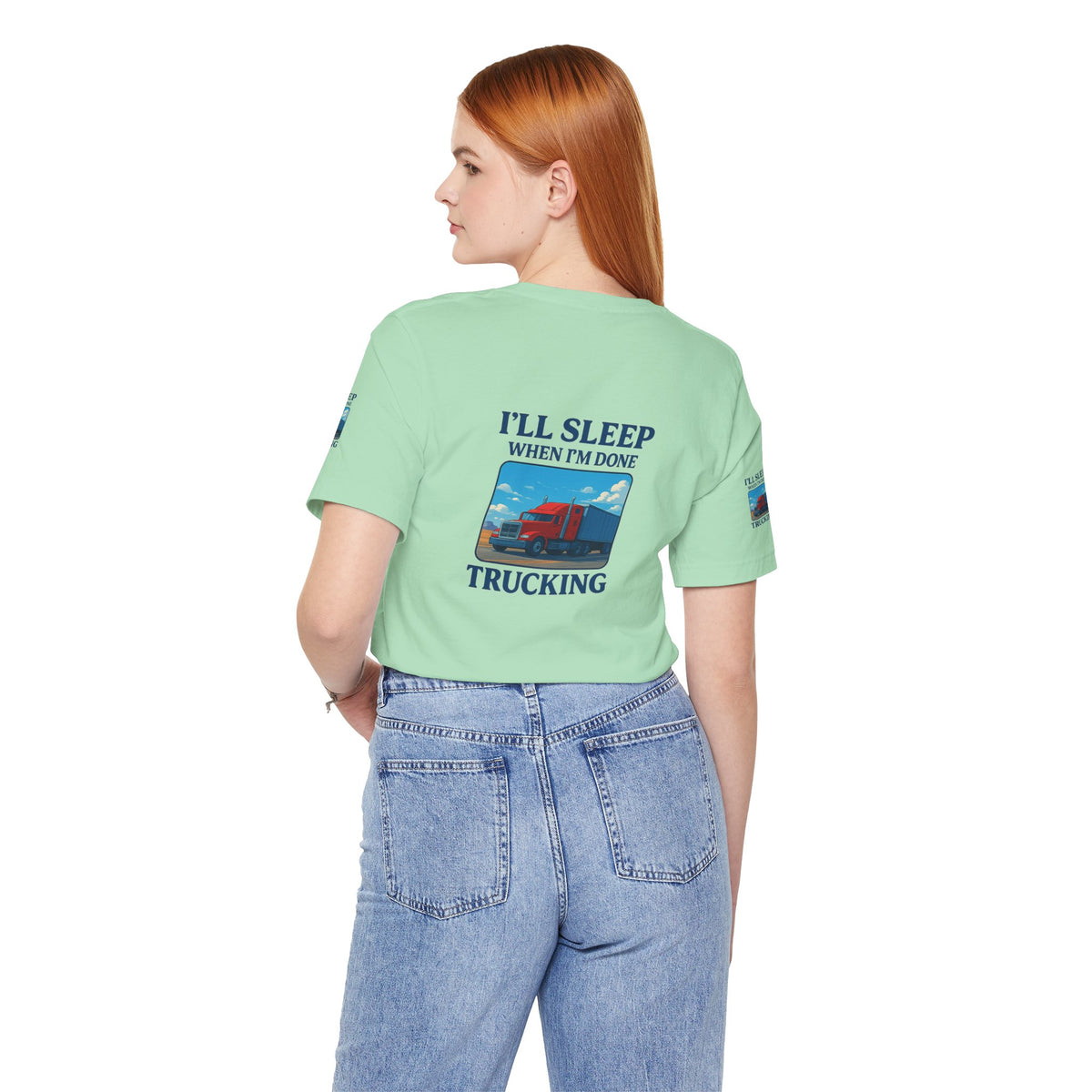 Unisex Heather Gray T-Shirt with "I'll Sleep When I'm Done Trucking" slogan, casual short sleeve trucker graphic tee by Printify
