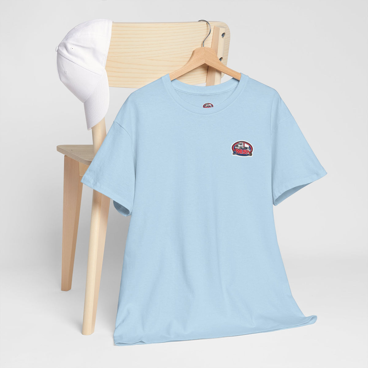 Funny unisex heavy cotton T-shirt with "Sir, You Can't Park Here!" slogan, by Printify, shown in cornsilk color.