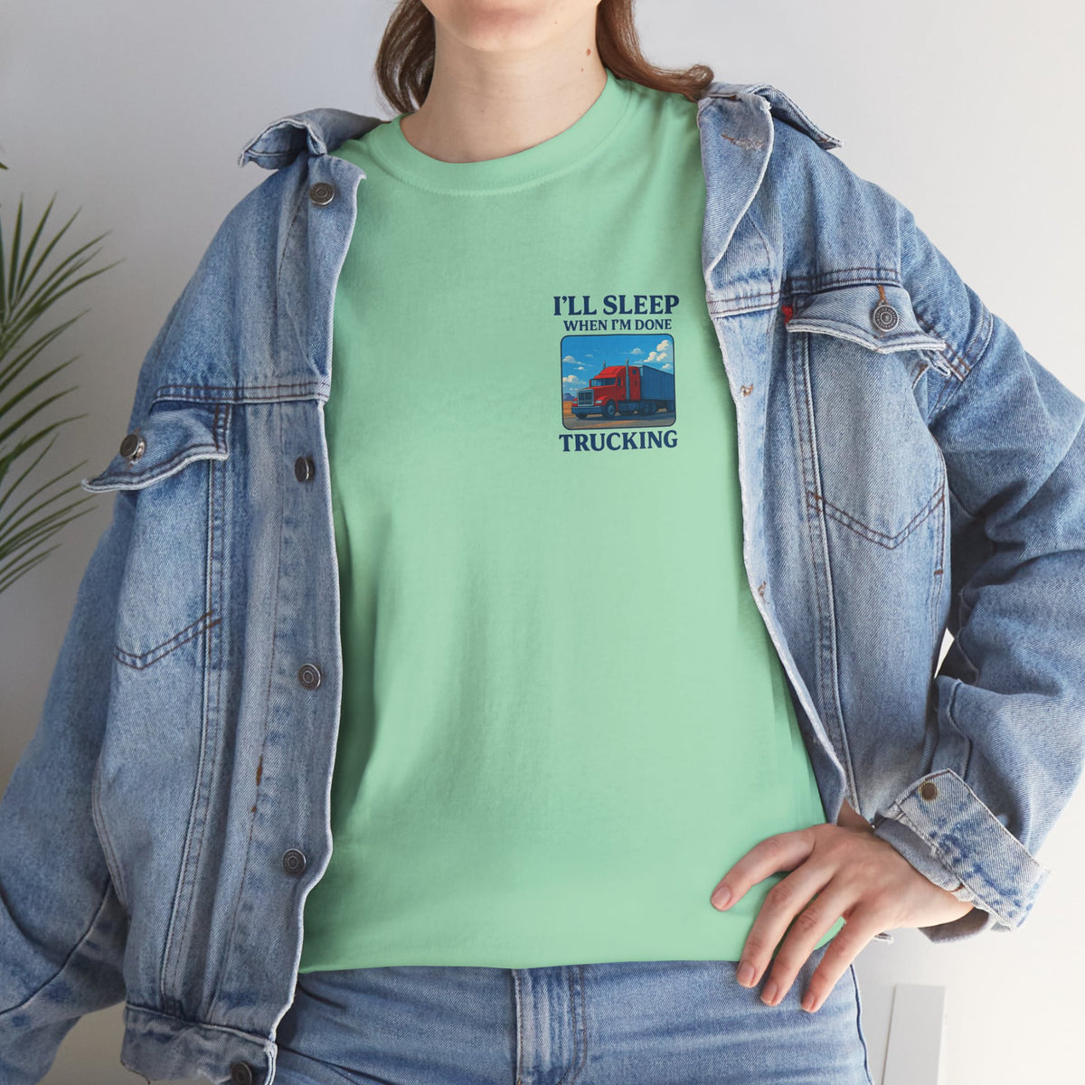 Light blue unisex heavy cotton T-shirt featuring "I'll Sleep When I'm Done Trucking" print, by Printify.