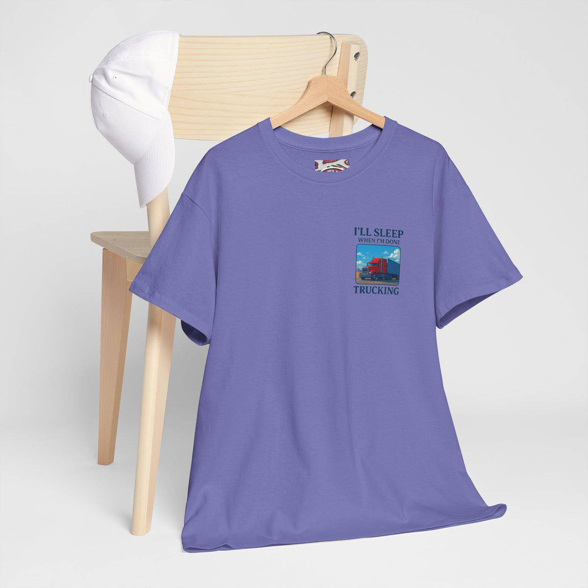 Light blue unisex heavy cotton T-shirt with "I'll Sleep When I'm Done Trucking" print, by Printify.