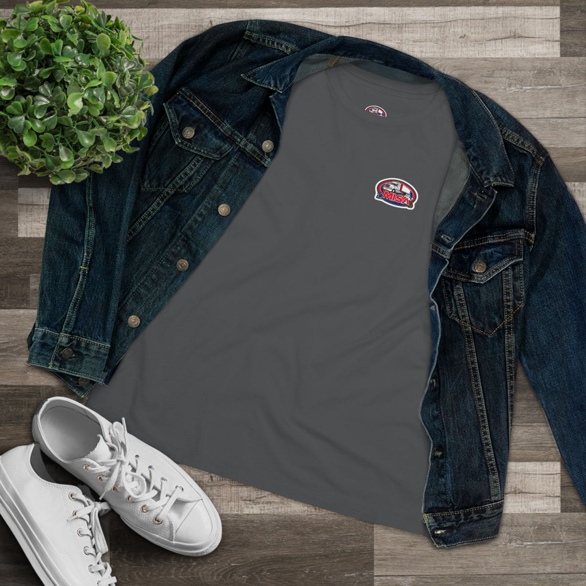 Patriotic women's cotton T-shirt with "We Drive America's Economy" slogan, black print on a casual black Tee.