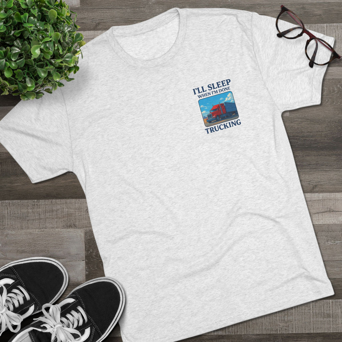 Unisex crew T-shirt featuring truck driver motivation quote "I'll Sleep When I'm Done" in bold print, made by Printify.