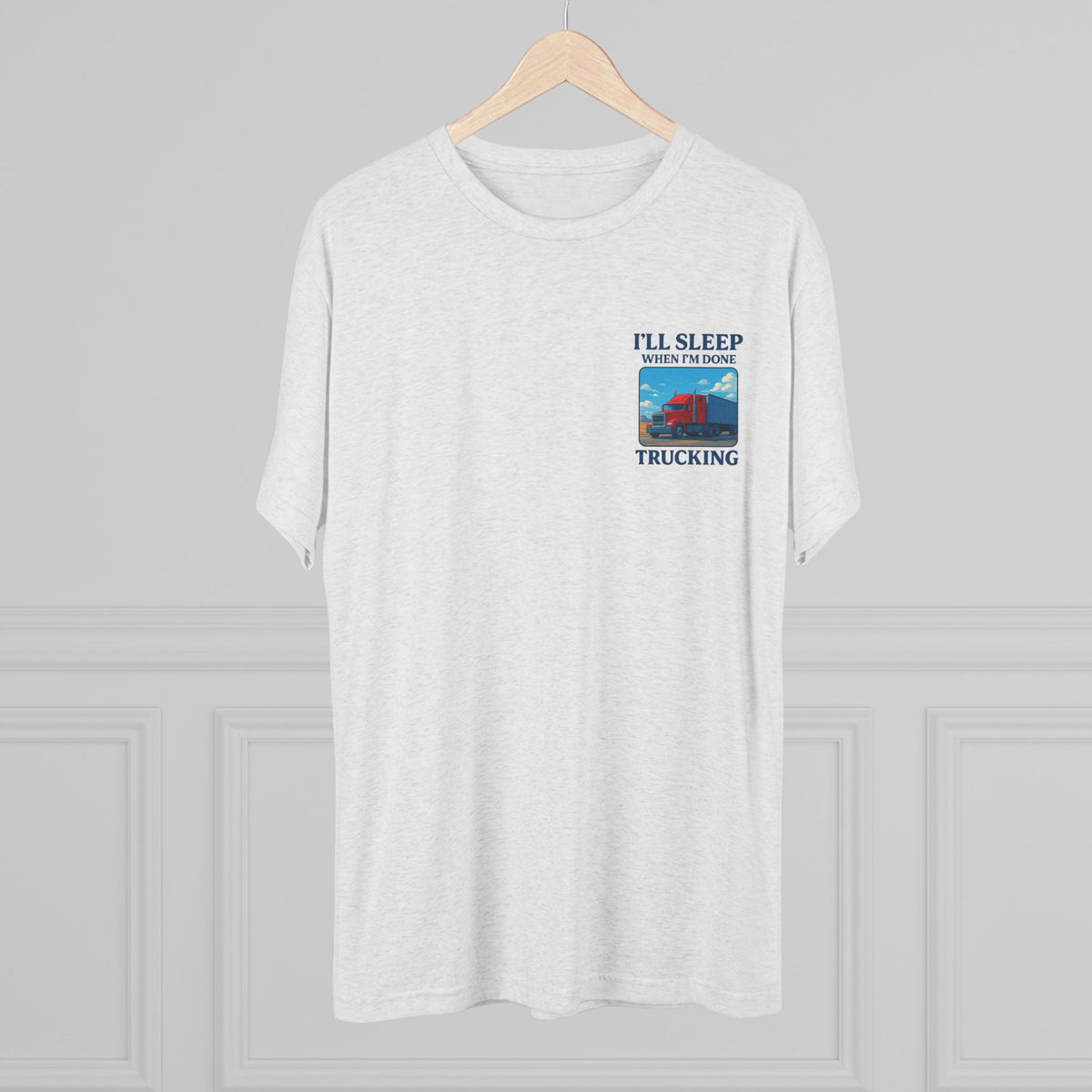 Unisex truck driver motivation T-shirt with "I'll Sleep When I'm Done" slogan in tri-blend fabric, printed by Printify.