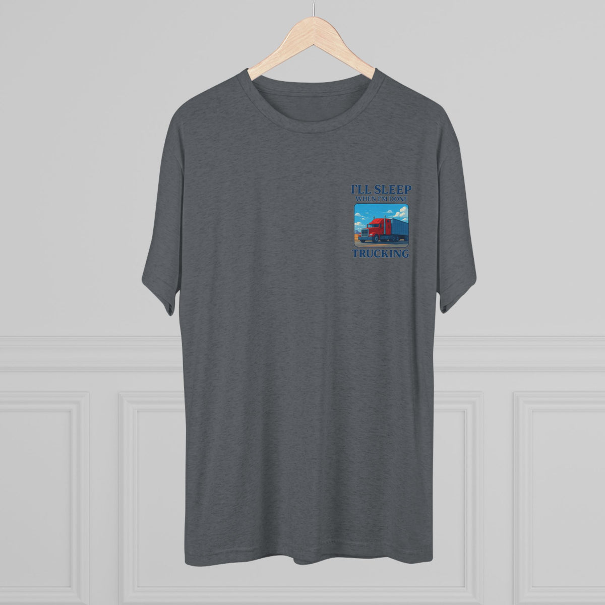 Unisex crew T-shirt with "I'll Sleep When I'm Done" truck driver motivation slogan, made by Printify, in black tri-blend fabric.