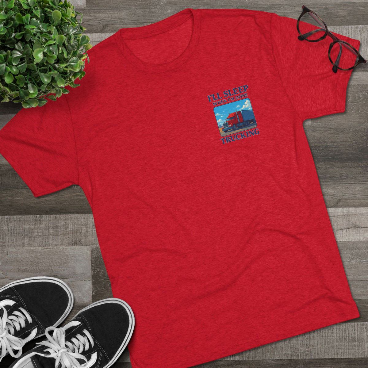 Unisex Printify truck driver motivation T-shirt with "I'll Sleep When I'm Done" slogan, crew neck, tri-blend fabric, casual fit.