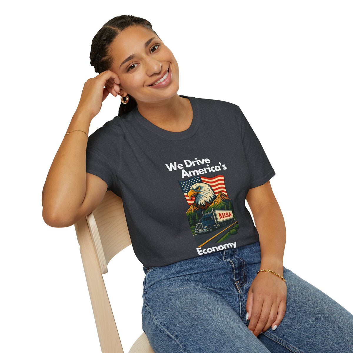 Charcoal unisex softstyle T-shirt with vintage truck graphic and "We Drive America's Economy" slogan, designed by Printify.