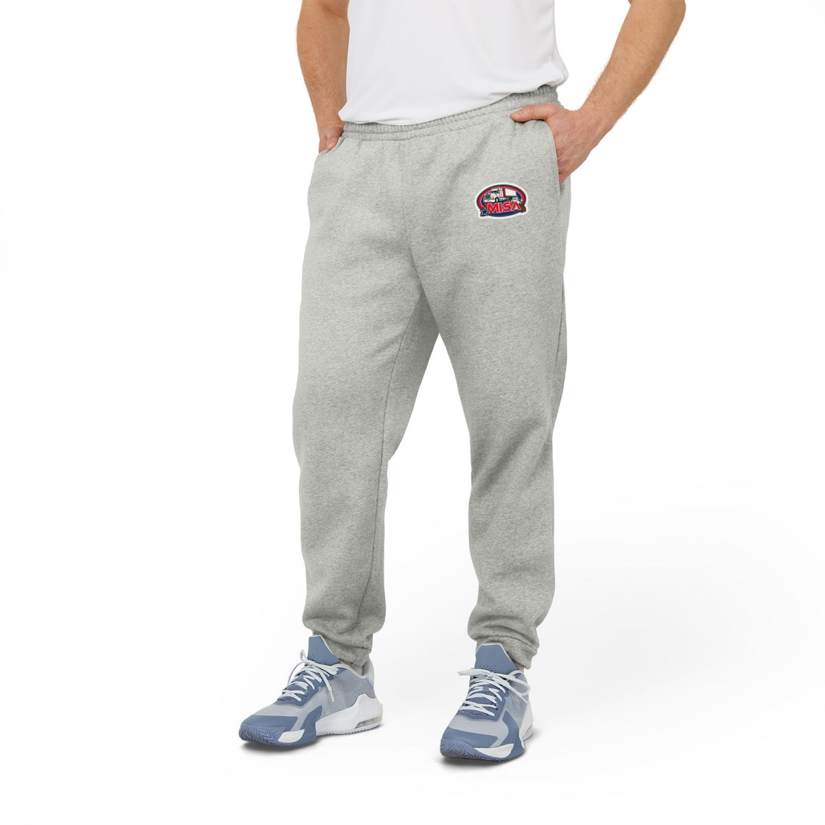 Black adidas unisex fleece joggers, comfortable athleisure trousers with elastic waistband and relaxed fit for casual wear.